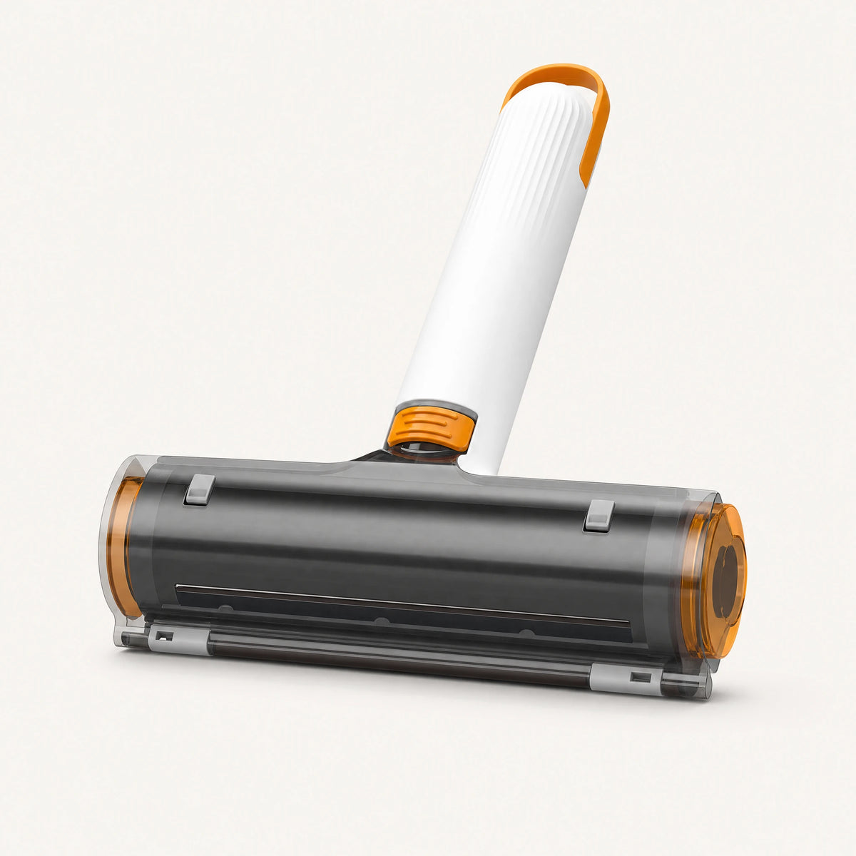 White and orange reusable pet hair roller with a smoky transparent collection cover, ridged handle and hanging loop.