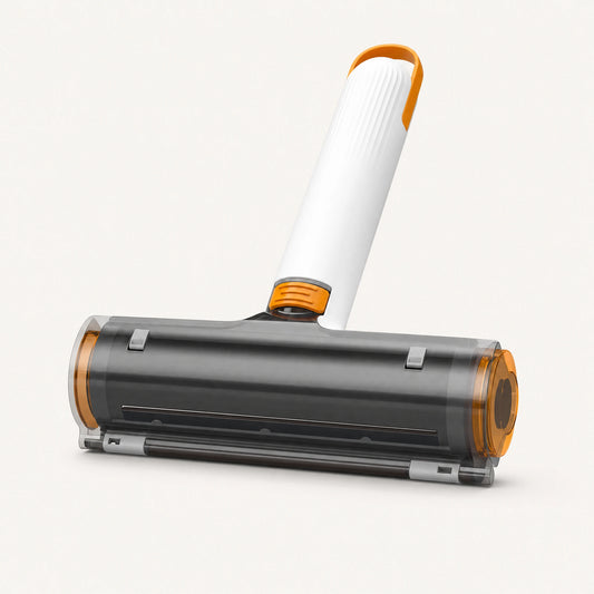 White and orange reusable pet hair roller with a smoky transparent collection cover, ridged handle and hanging loop.